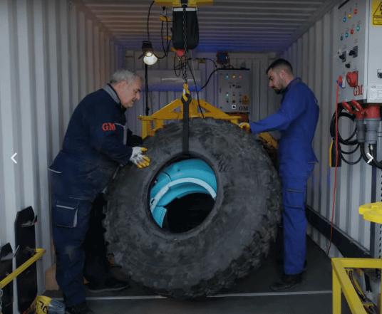 Run-flat insert operation inside containerized workshop